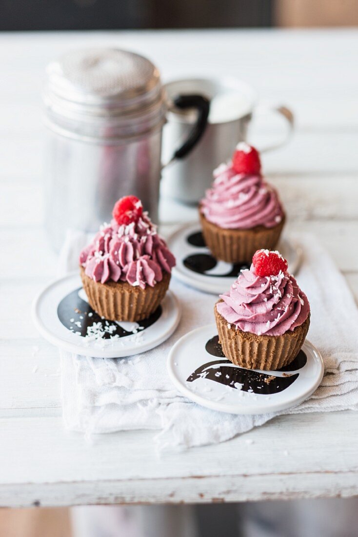 Vegan chocolate cupcakes with raspberry frosting