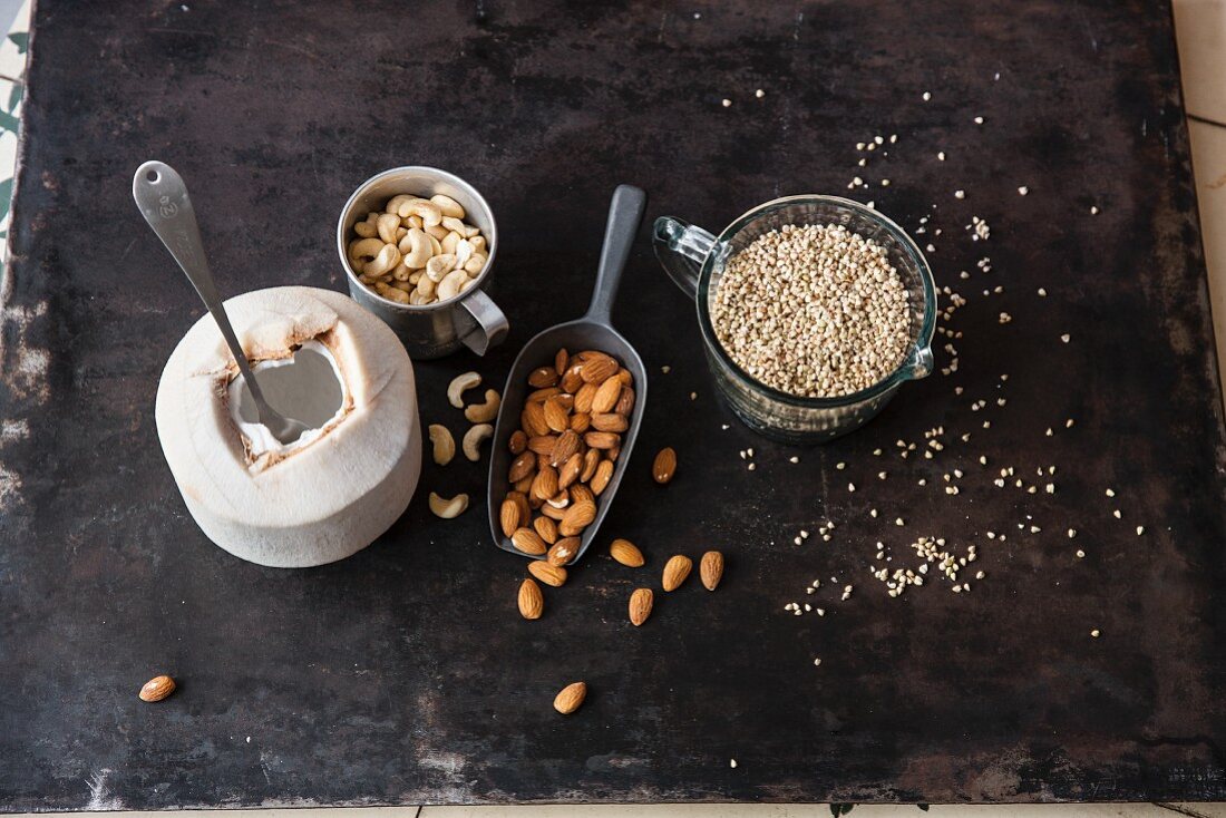 Vegan ingredients for raw baking: cashews, buckwheat, coconut and almonds