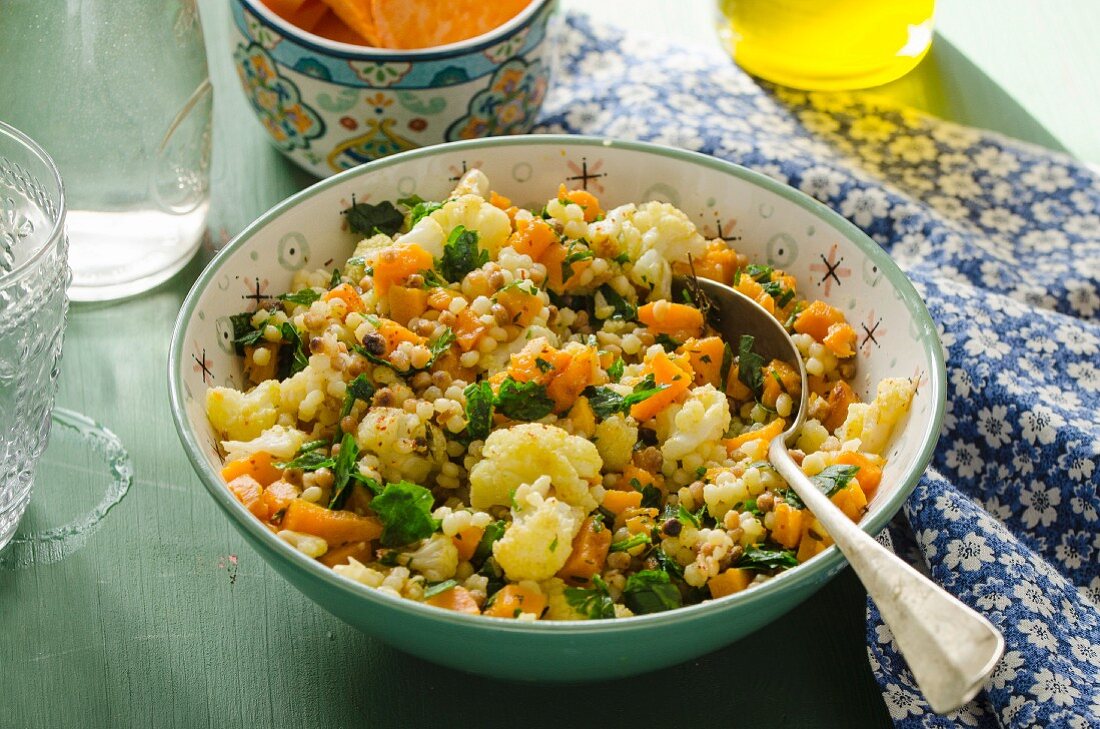 Fregola salad with fried cauliflower and sweet potatoes