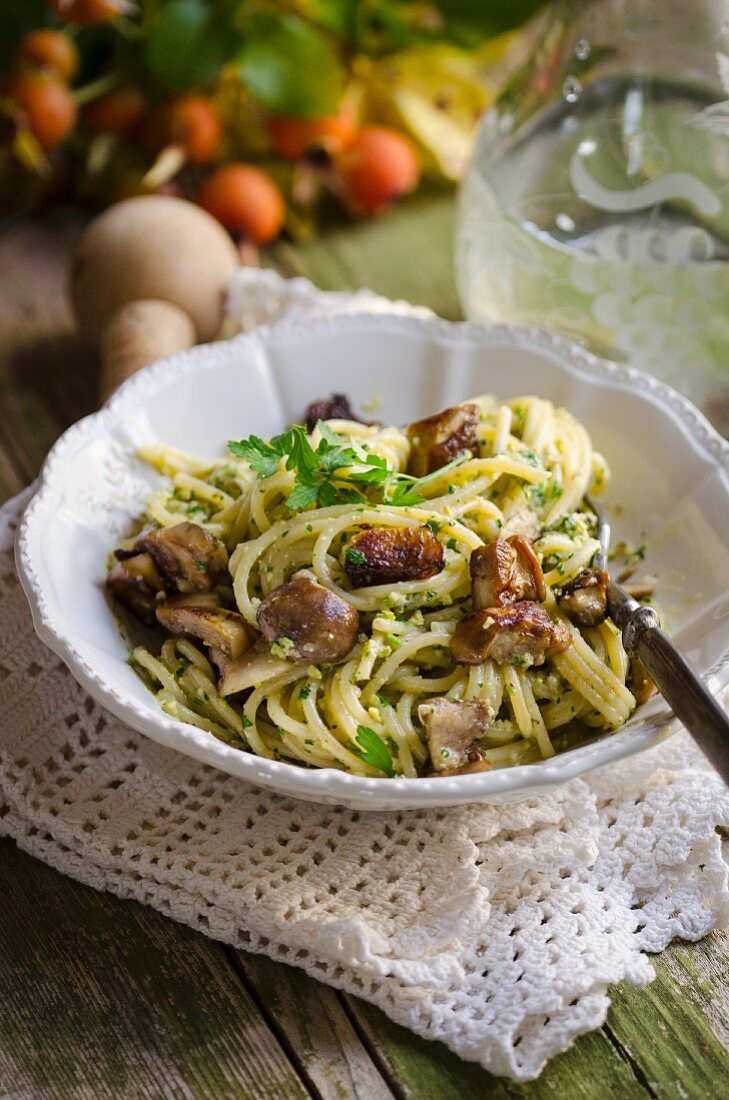 Spaghetti with mushrooms and pistachio pesto
