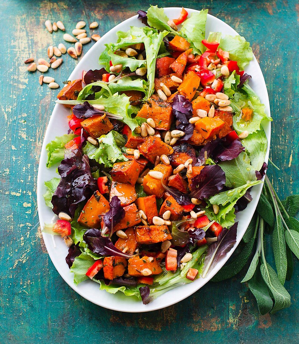 Warm pumpkin salad with pine nuts