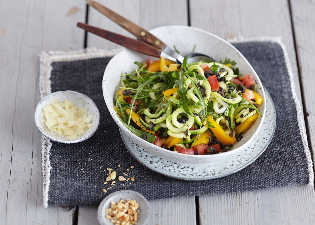 Vegetarian courgette pasta salad with yellow pepper and olives