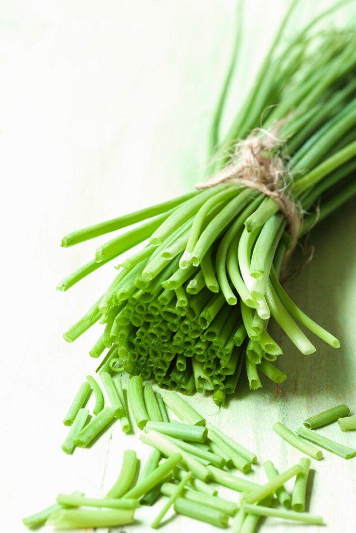 Fresh chives, in bundles and sliced