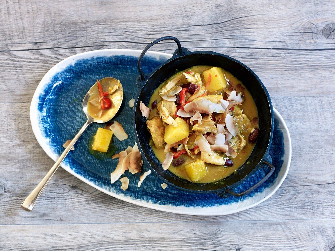 Caribbean chicken curry with pineapple and coconut chips