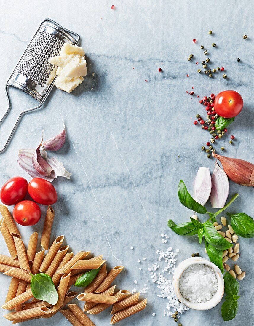 An arrangement of assorted ingredients for pasta dishes (from above)