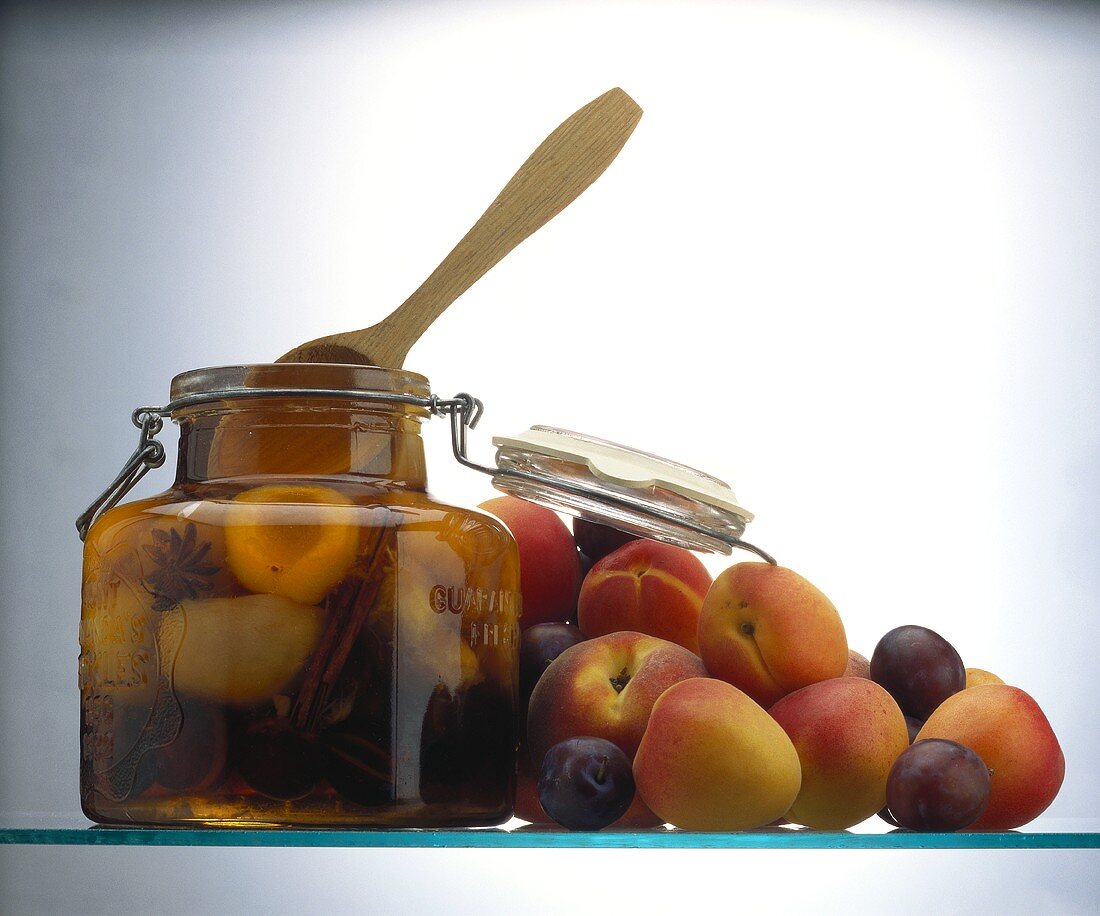Assorted Stone Fruit in a Preserving Jar