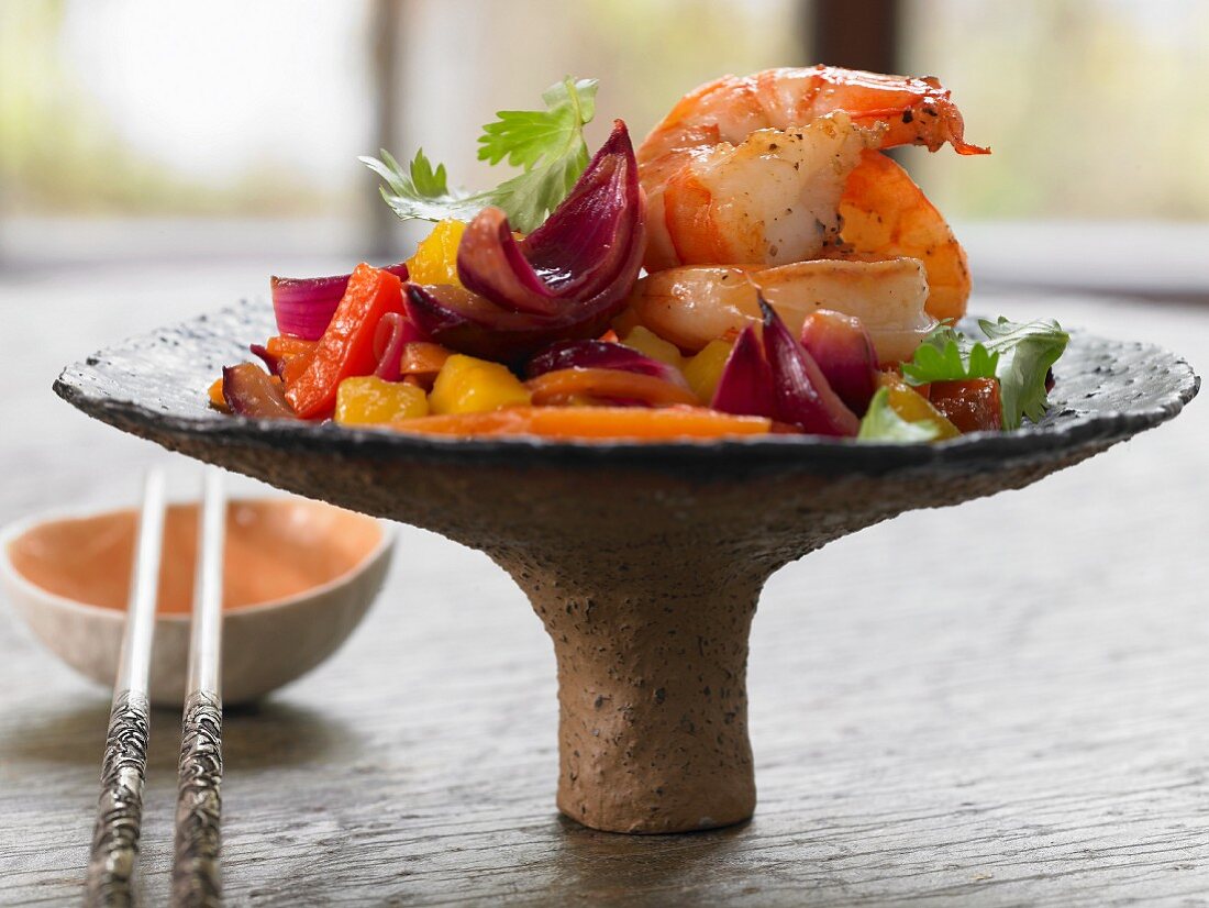 Sweet and sour prawns with mango and peppers