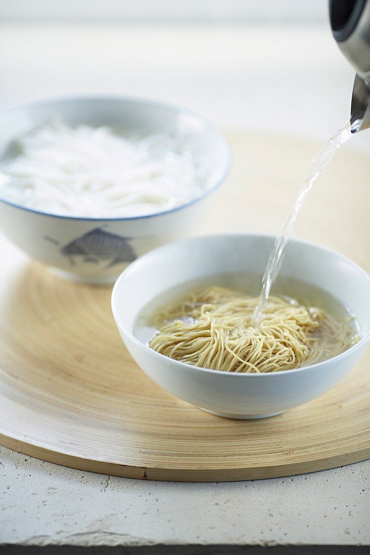 Asian noodles poured with water