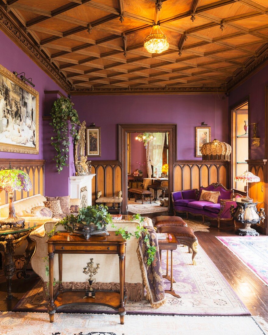 Coffered ceiling and lilac walls in living area
