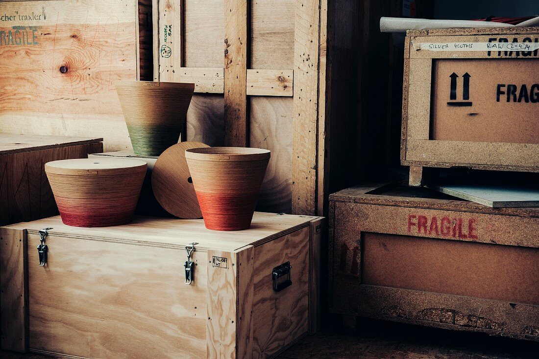 Containers made of veneer strips arranged on wooden boxes, designed by Katharina Mischer and Thomas Traxler