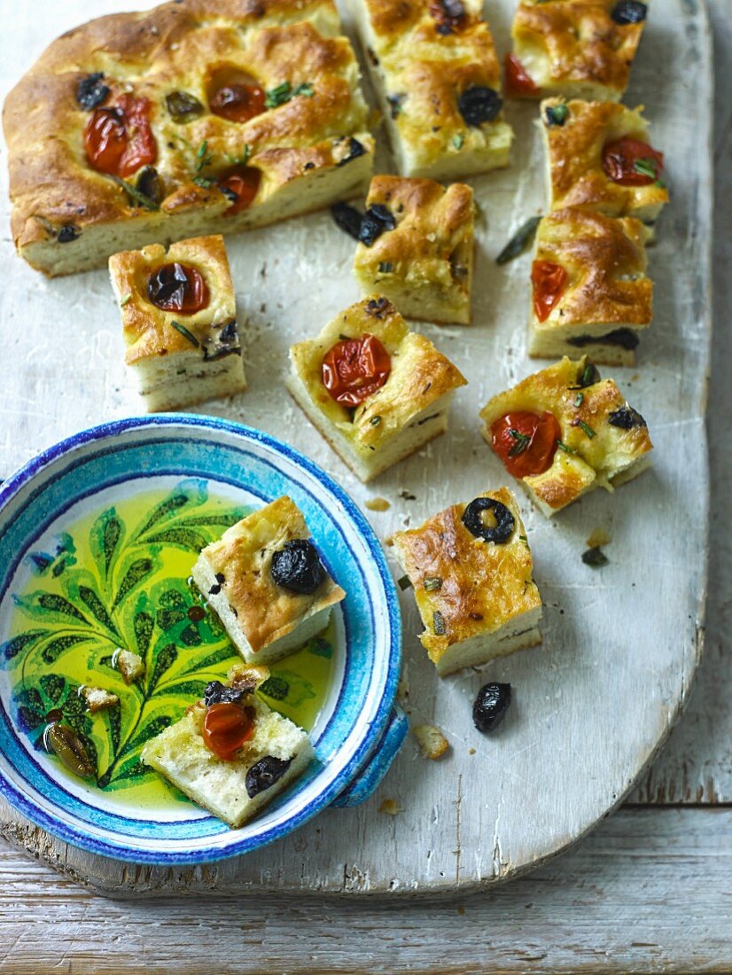 Focaccia with preserved tomatoes,olives and thyme