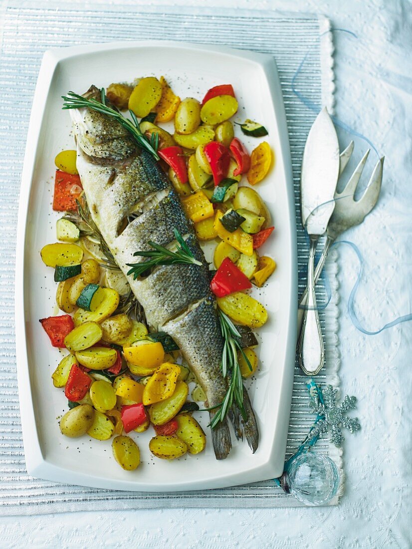 Bass with rosemary and vegetables for Christmas
