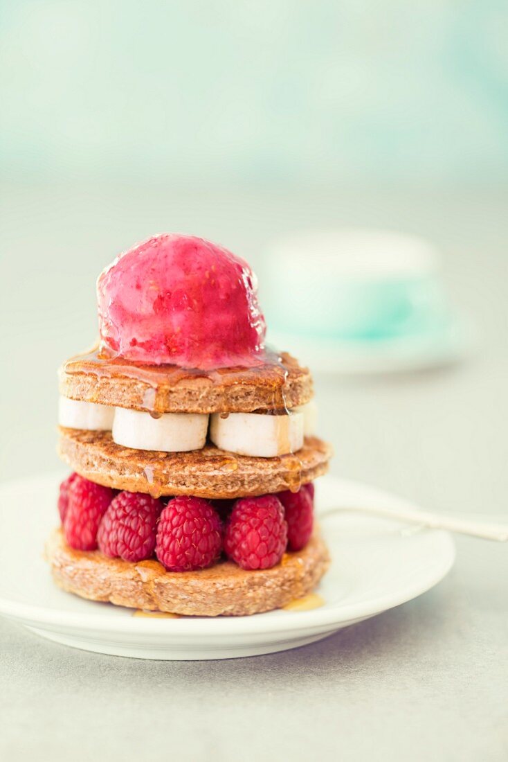 A pancake tart with raspberries and raspberry sorbet