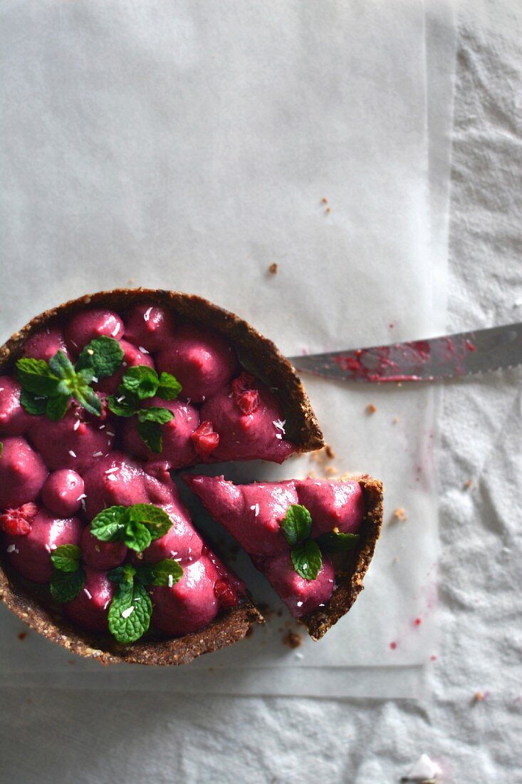 A vegan lemon, thyme and raspberry tart with a cocoa butter mousse