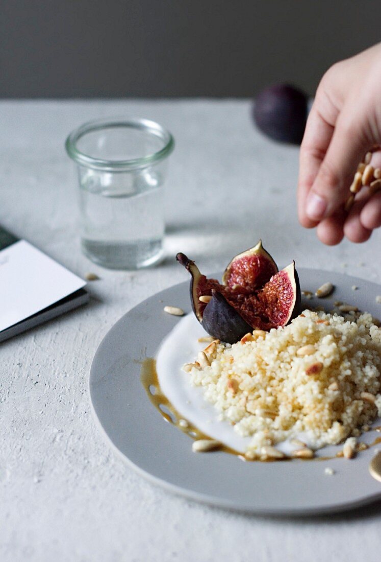 Lemon couscous with coconut yoghurt, figs and pine kernels