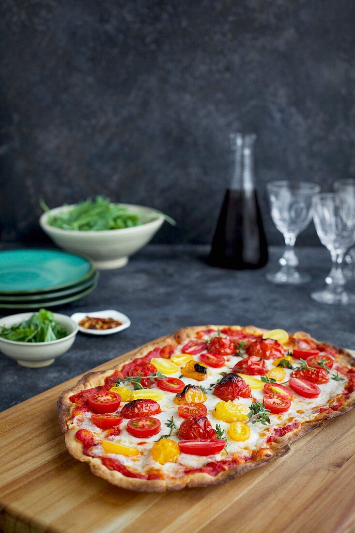 Roasted Tomato Pizza with a thin Olive Oil Cracker Crust