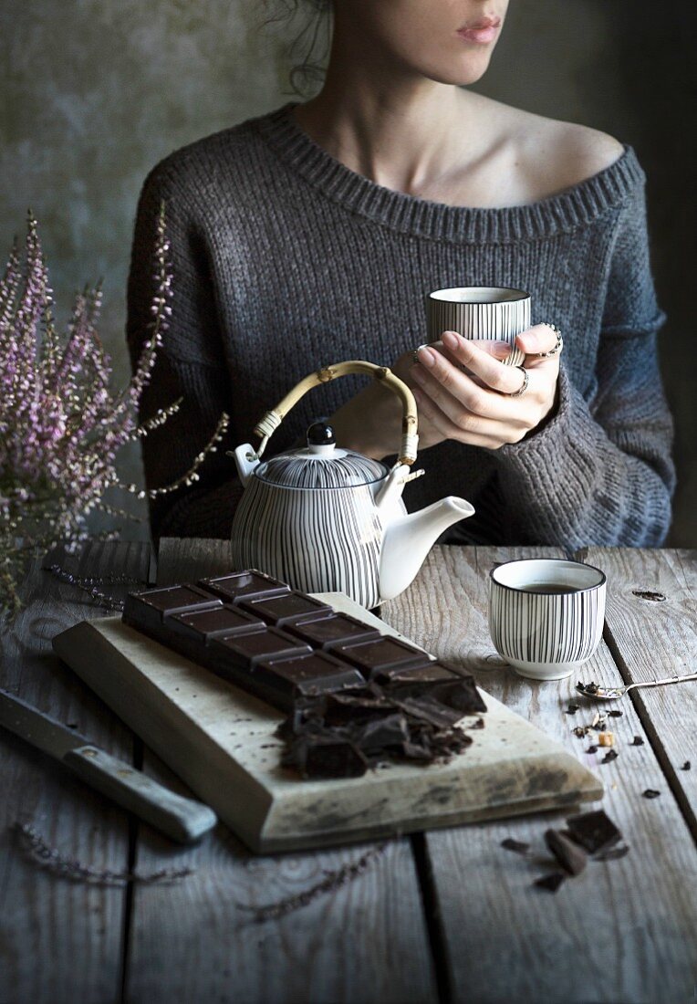 Tea time: woman drinking a cup of tea