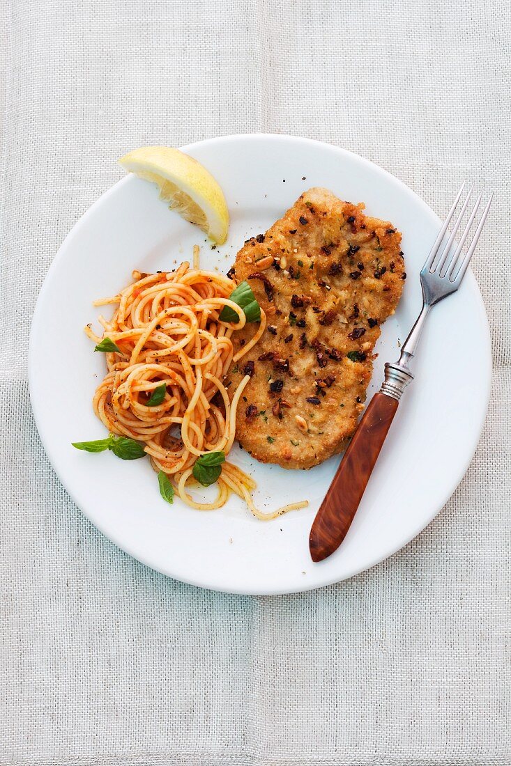 A salmon dish with spaghetti (Italy)