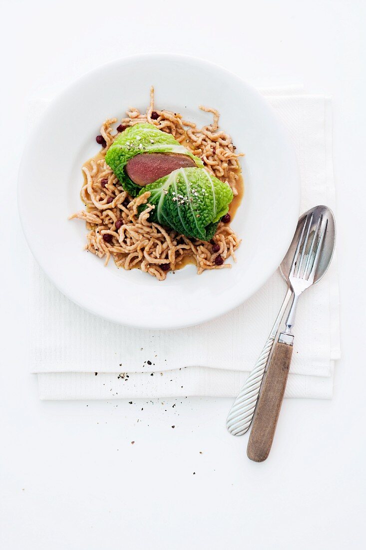 Venison steaks and savoy cabbage with walnut and cinnamon noodles