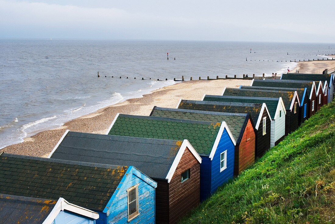 Colourful beach huts on Suffolk beach