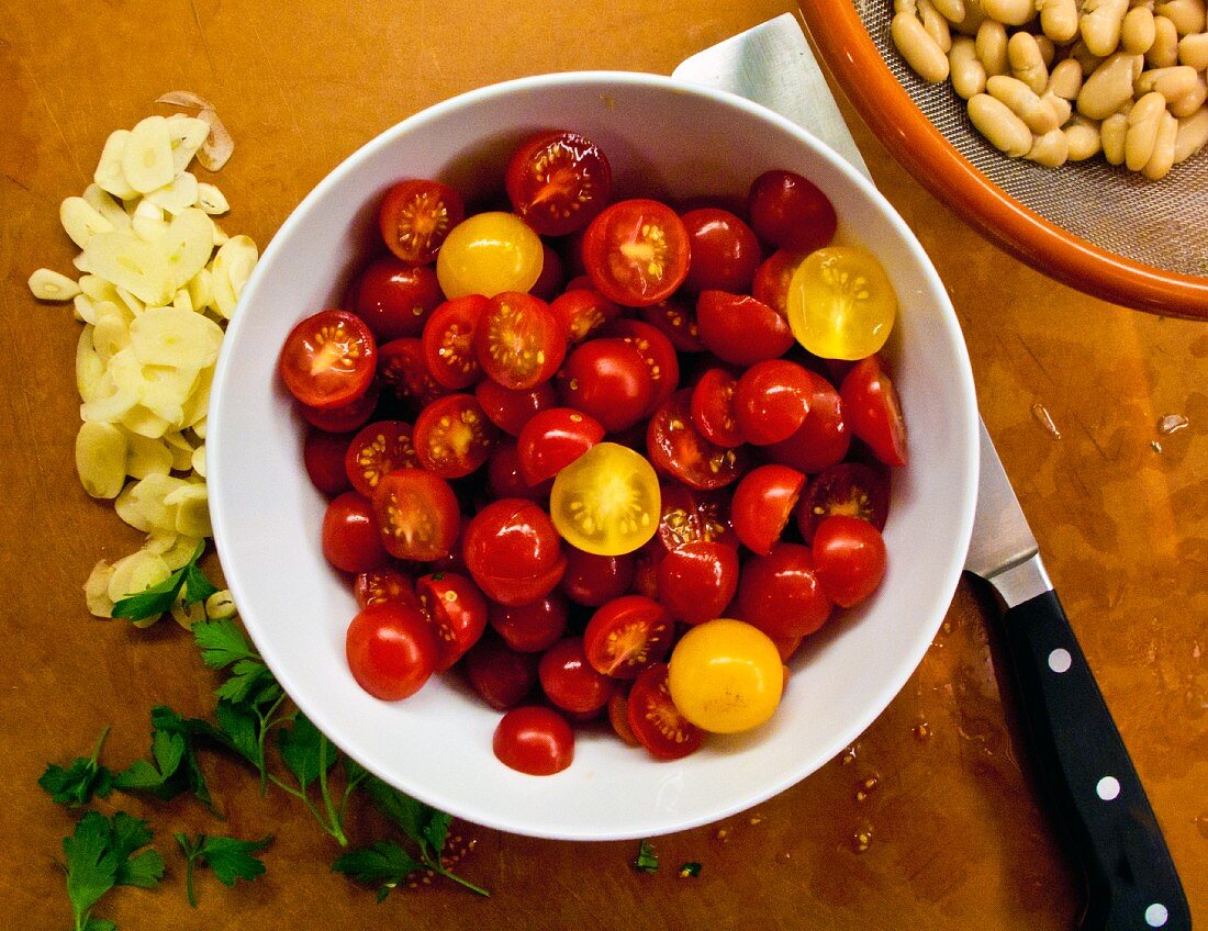 Sliced cherry tomatoes in bowl