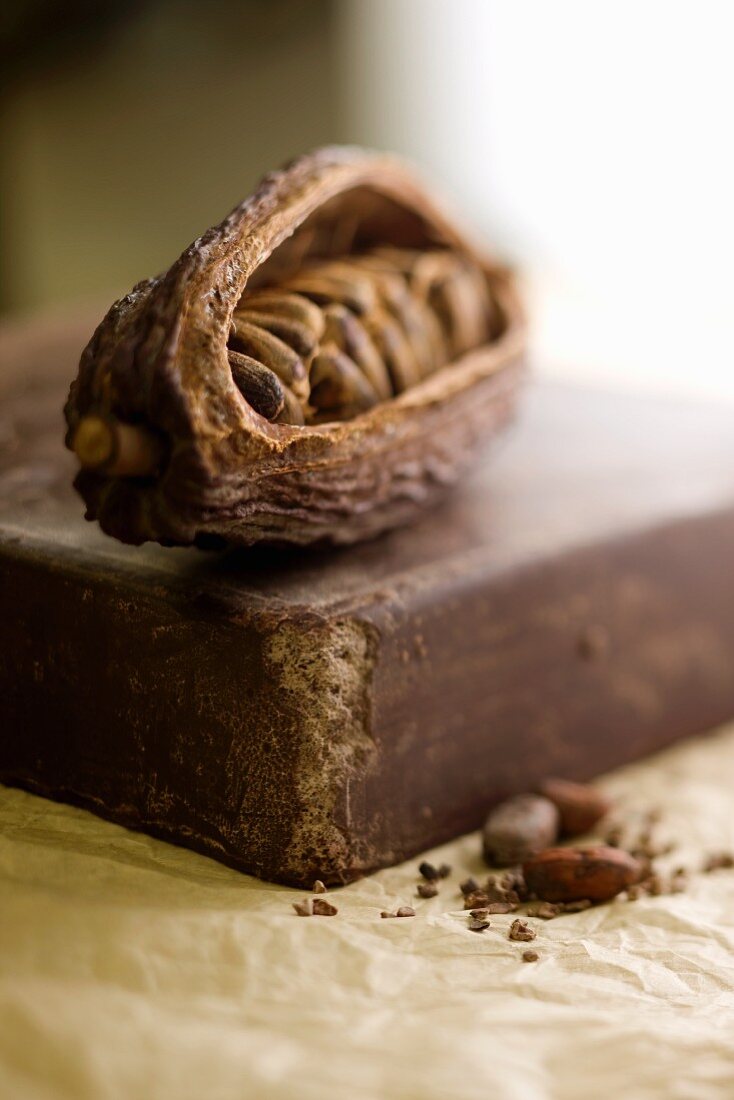 Cocoa beans and a slab of chocolate