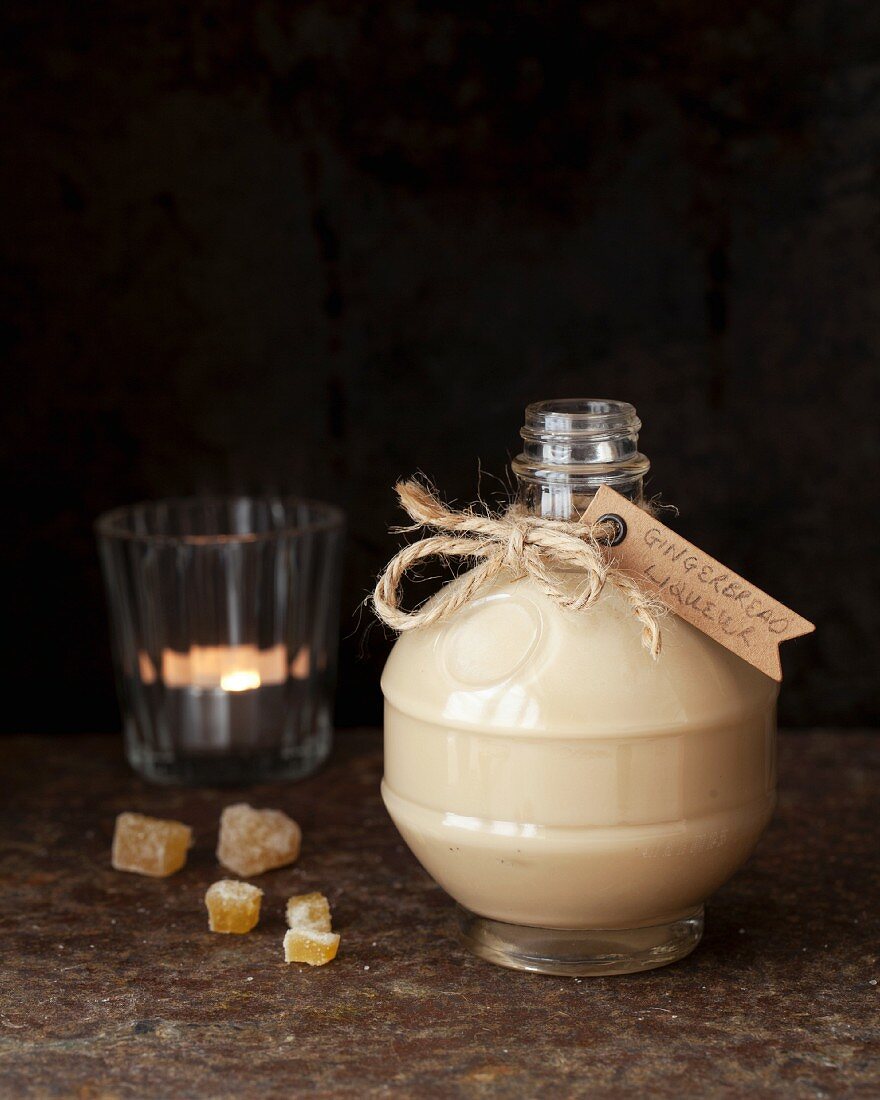 Homemade gingerbread liqueur in a decorative bottle for gifting