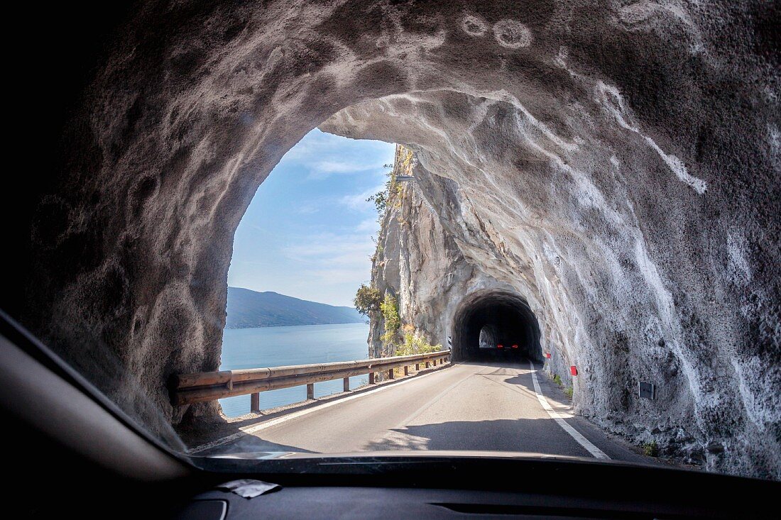 A tunnel on the SP 38 road along the shore of Lake Garda in Italy