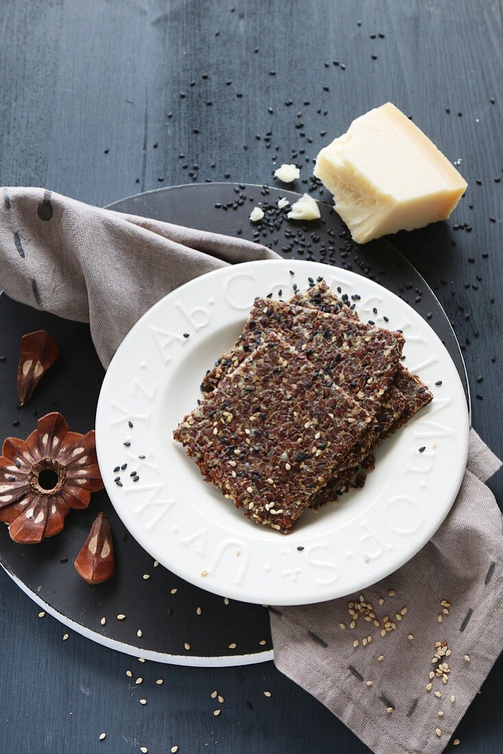 Gluten-free linseed bread with black and white sesame seeds and parmesan cheese