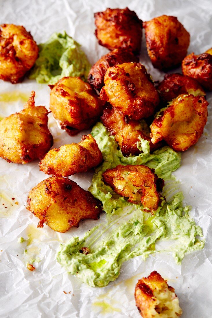 Fried potato puffs with avocado mayonnaise (soul food)