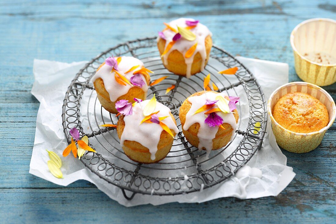 Small coconut and banana cakes with edible flowers