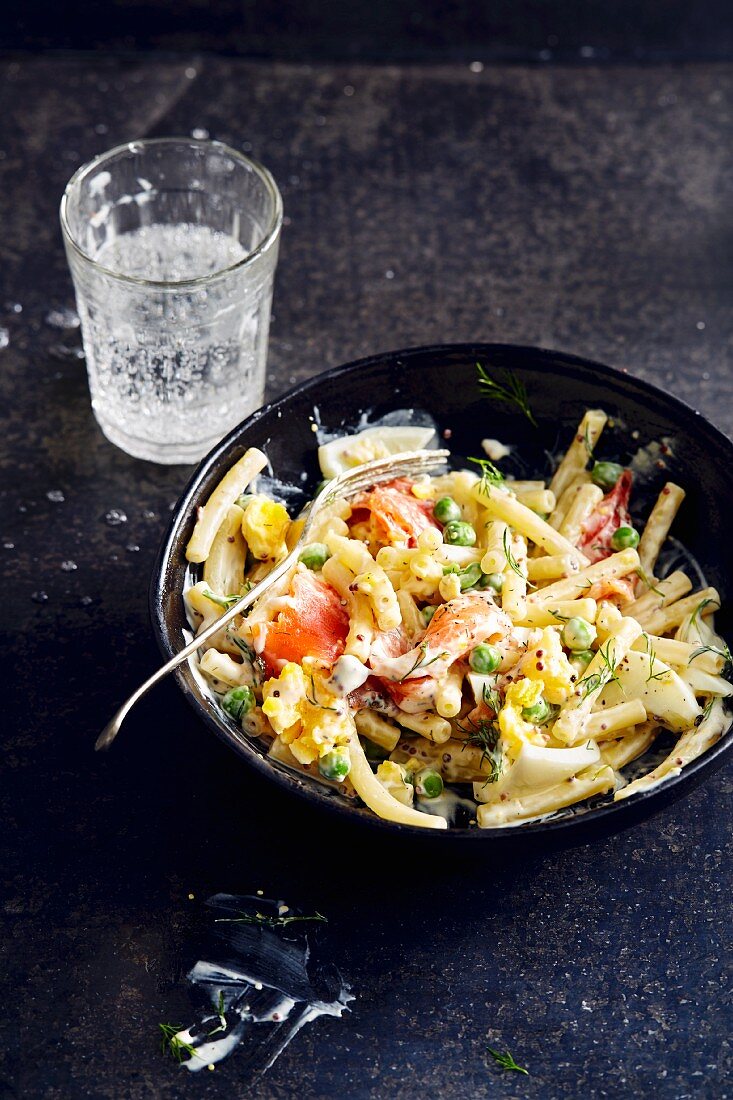 Pasta salad with peas, hard-boiled eggs and gravlax (soul food)