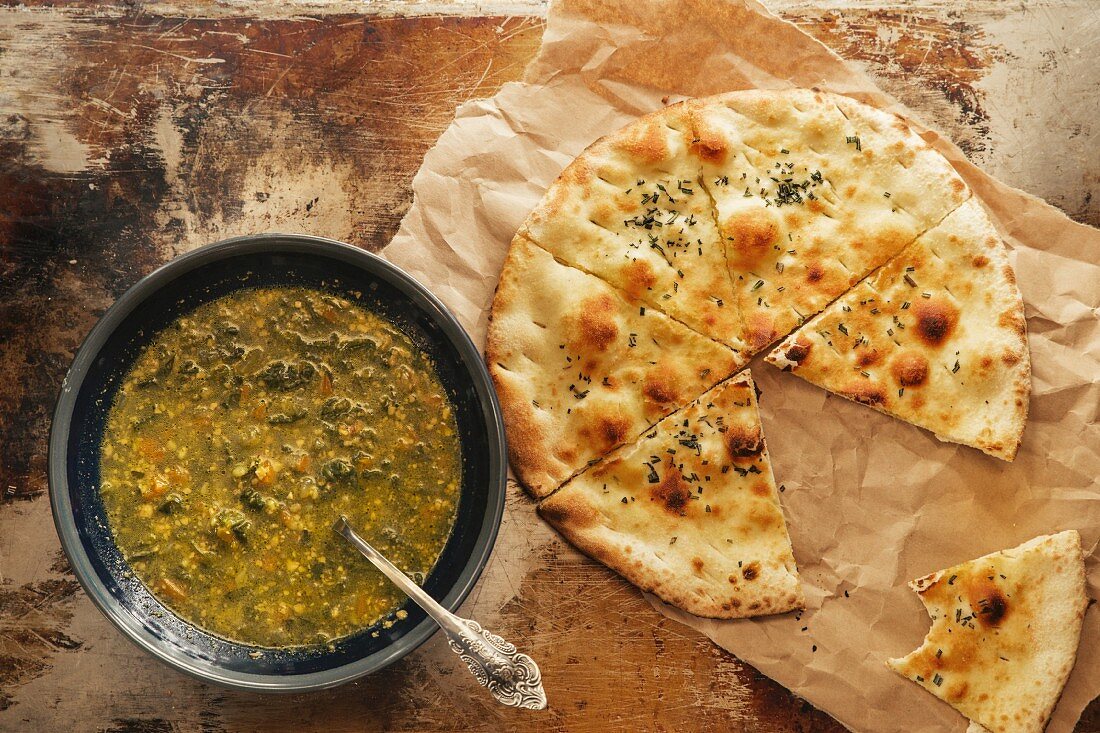 Spinach soup with flatbread (top view)