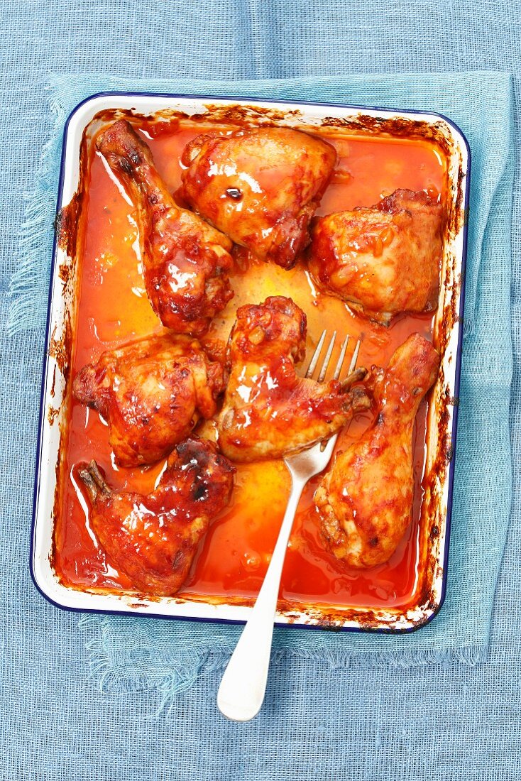 Chicken wings, thights and drumstick baked with bbq sauce and apricot glaze