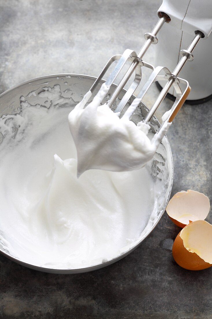 Egg whites being beaten with a mixer