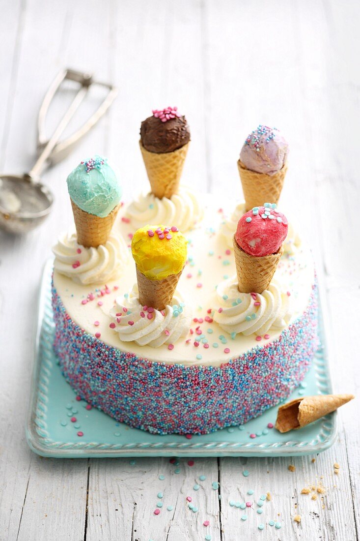 'Let's party' buttercream cake decorated with ice cream cones