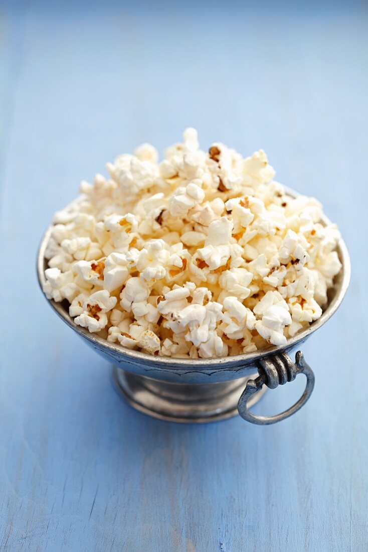 Popcorn in silver bowl