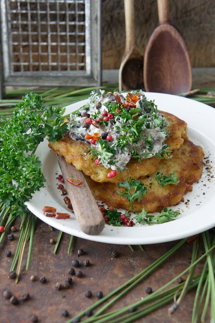 Potato fritters with wild mushrooms in a creamy sauce