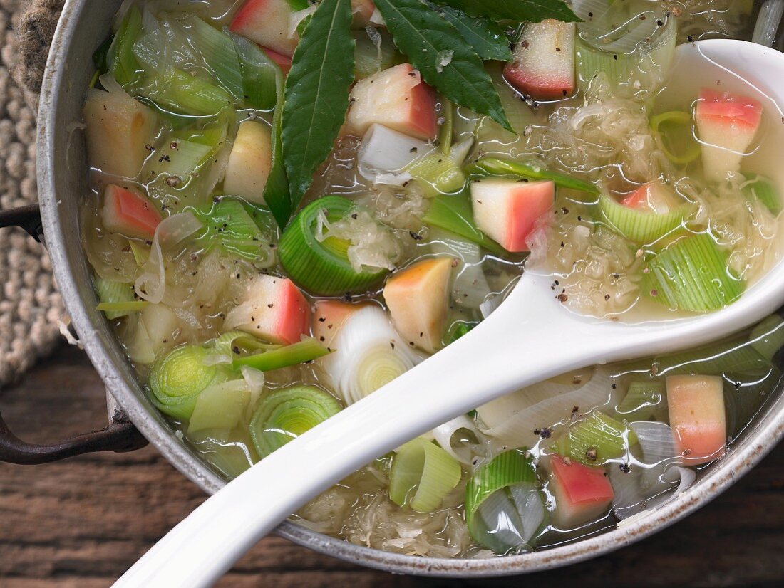 Sauerkraut soup with apples, leeks, marjoram and cider