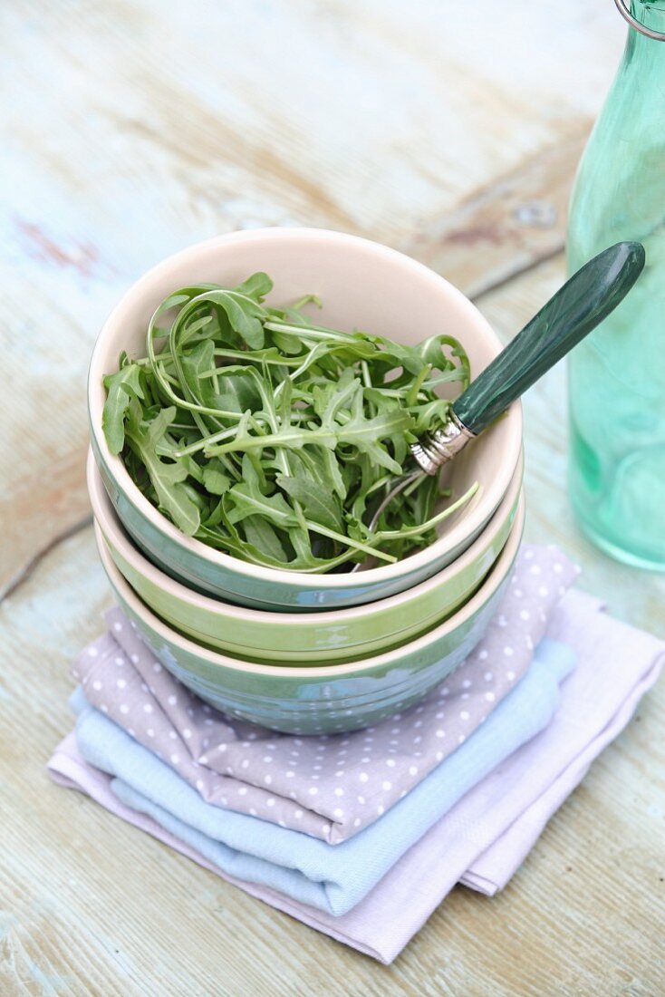 Fresh rocket in a small bowl