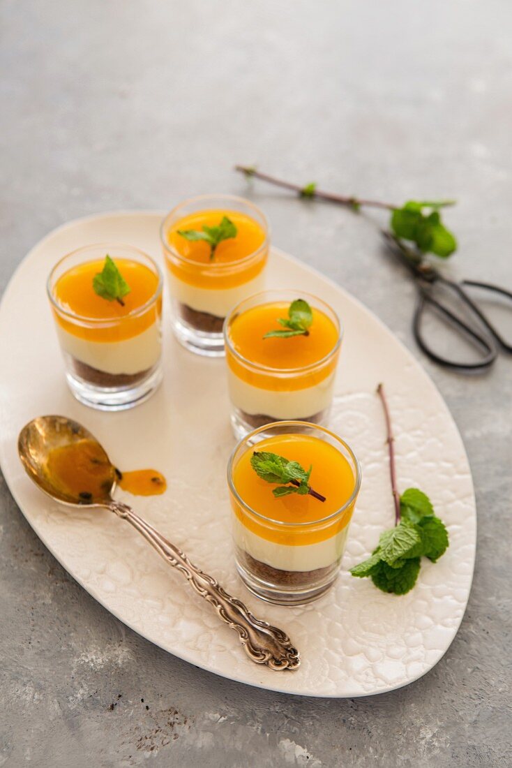 Passion fruit and cheesecake mousse in small glasses