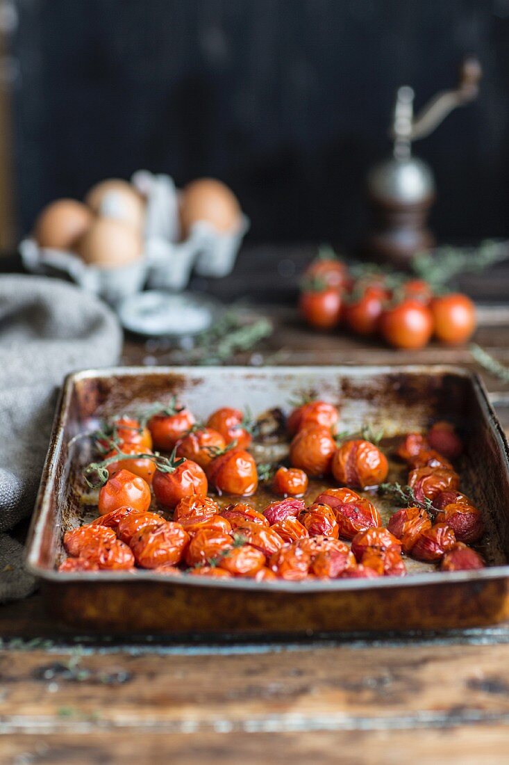 Fried tomatoes on a baking sheet