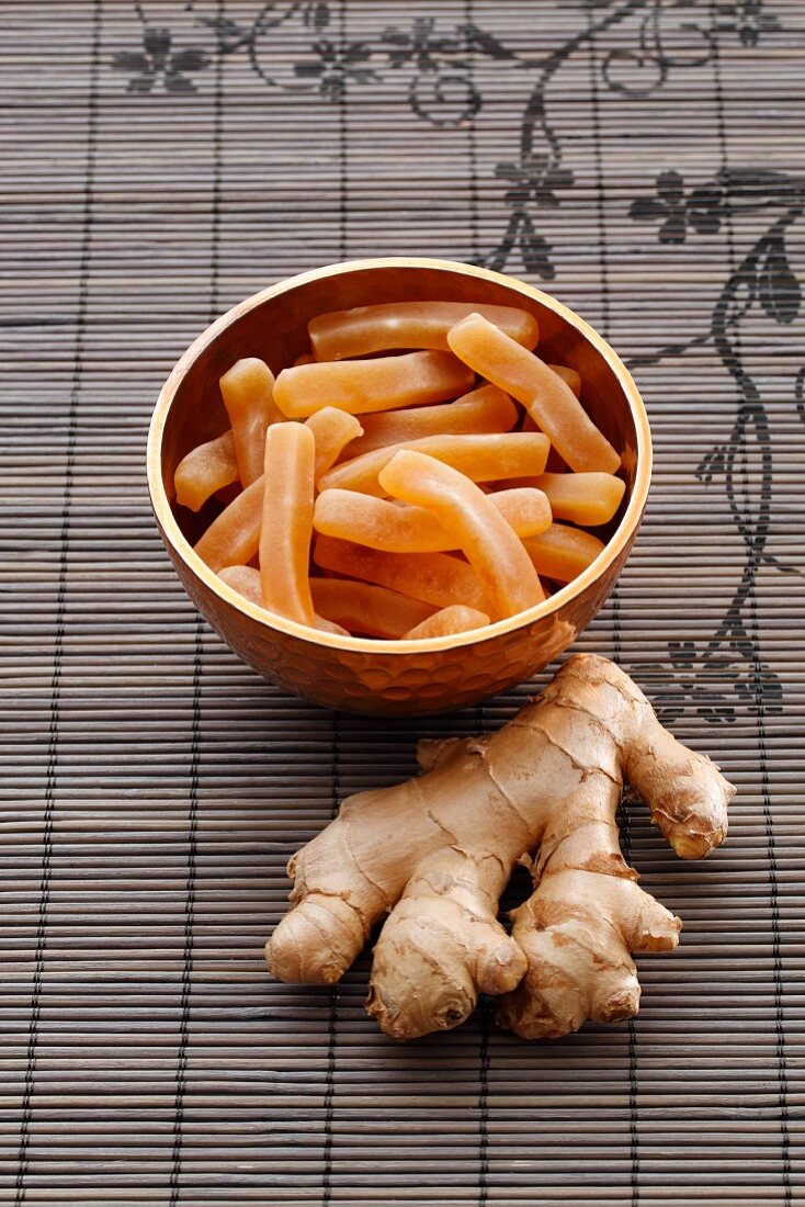 Ginger fruit gums and a fresh ginger root