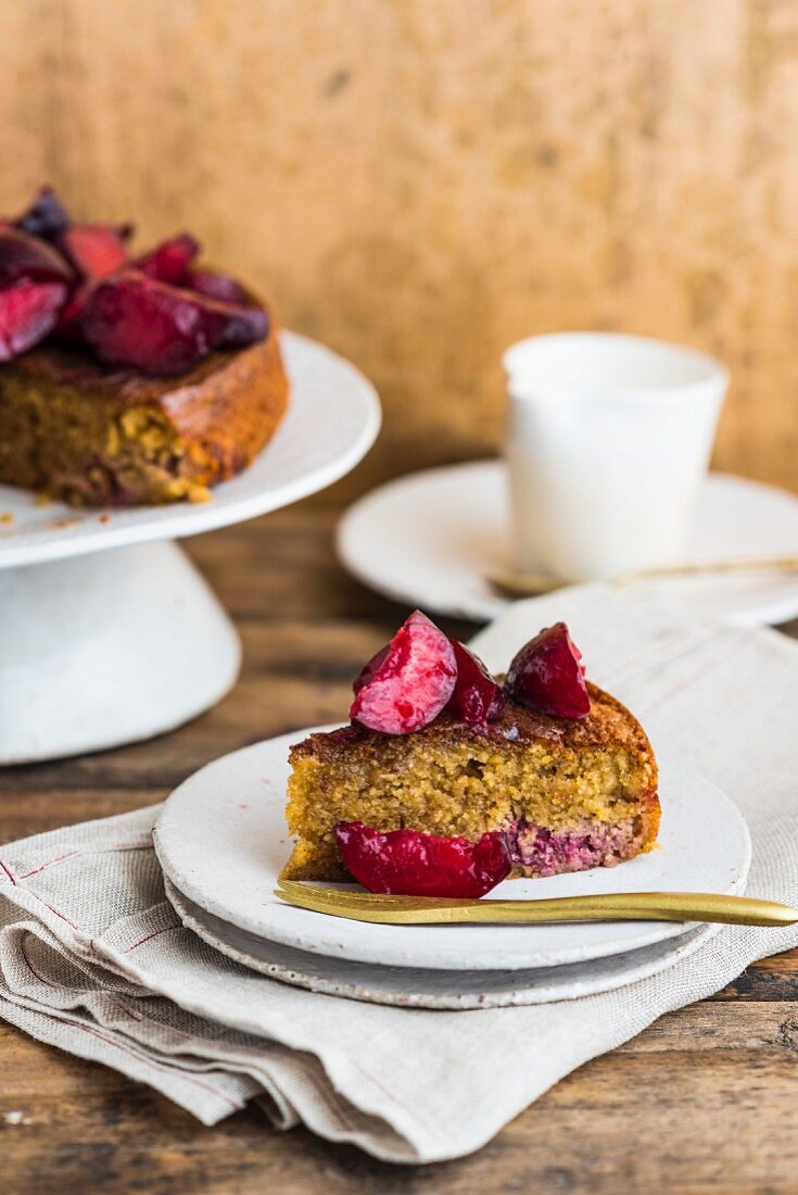 A slice of hazelnut and plum cake