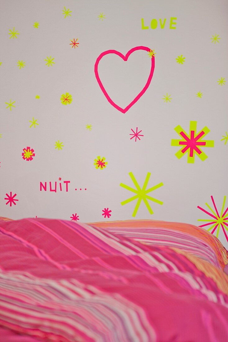 Wall decorated with heart and stars made from washi tape