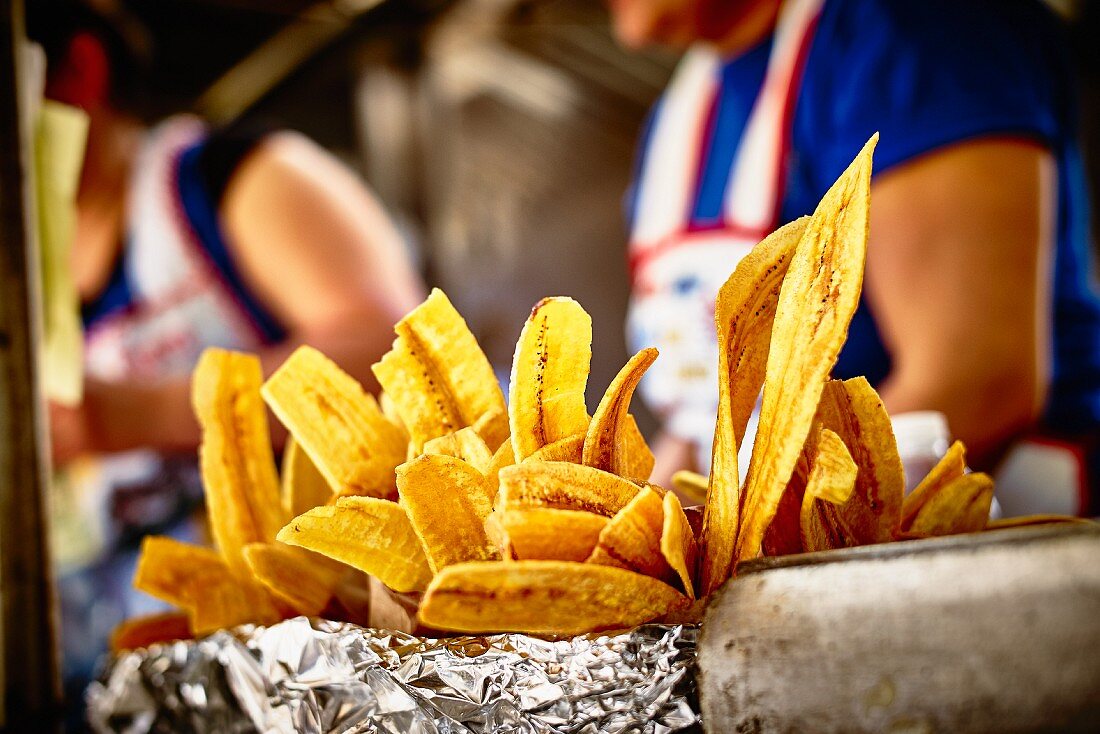 Sweet banana chips in a street kitchen (USA)