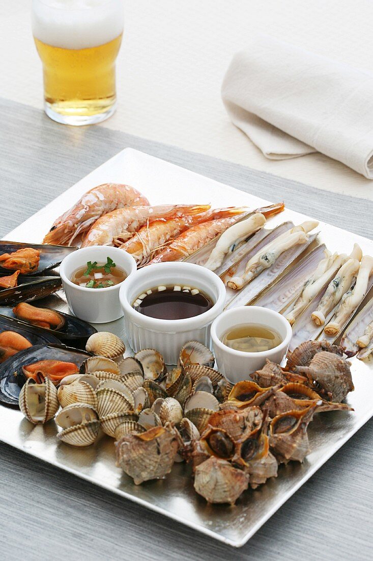 Grilled seafood with sauces