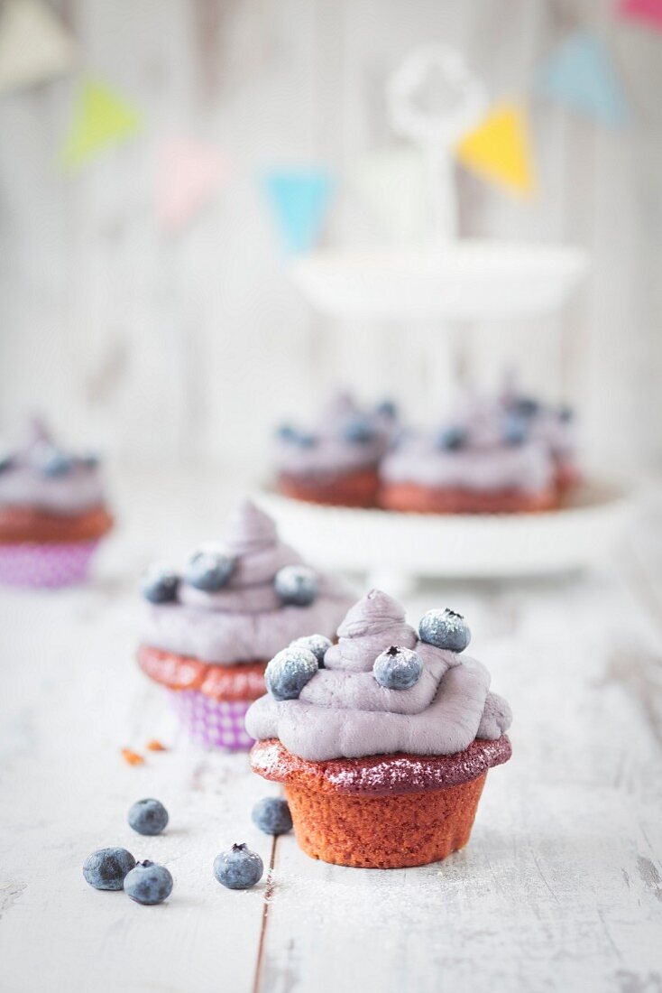 Red velvet cupcakes with blueberries