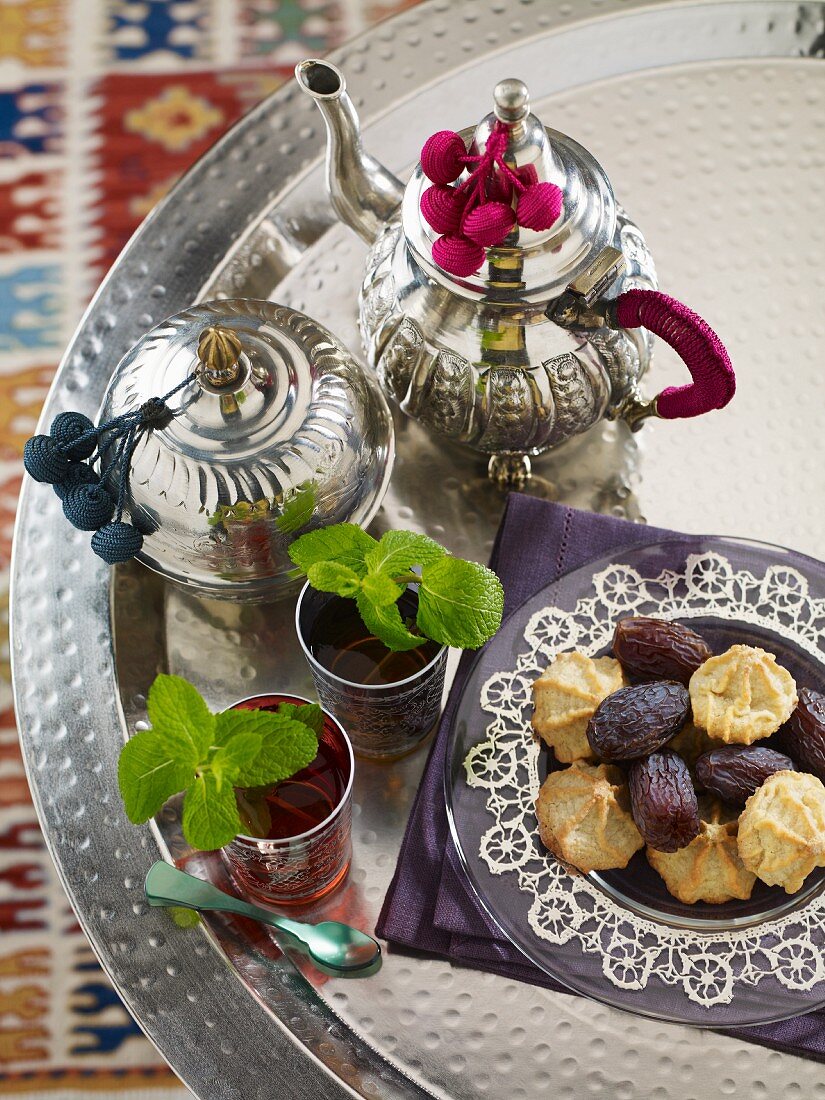 Peppermint tea, dates and biscuits