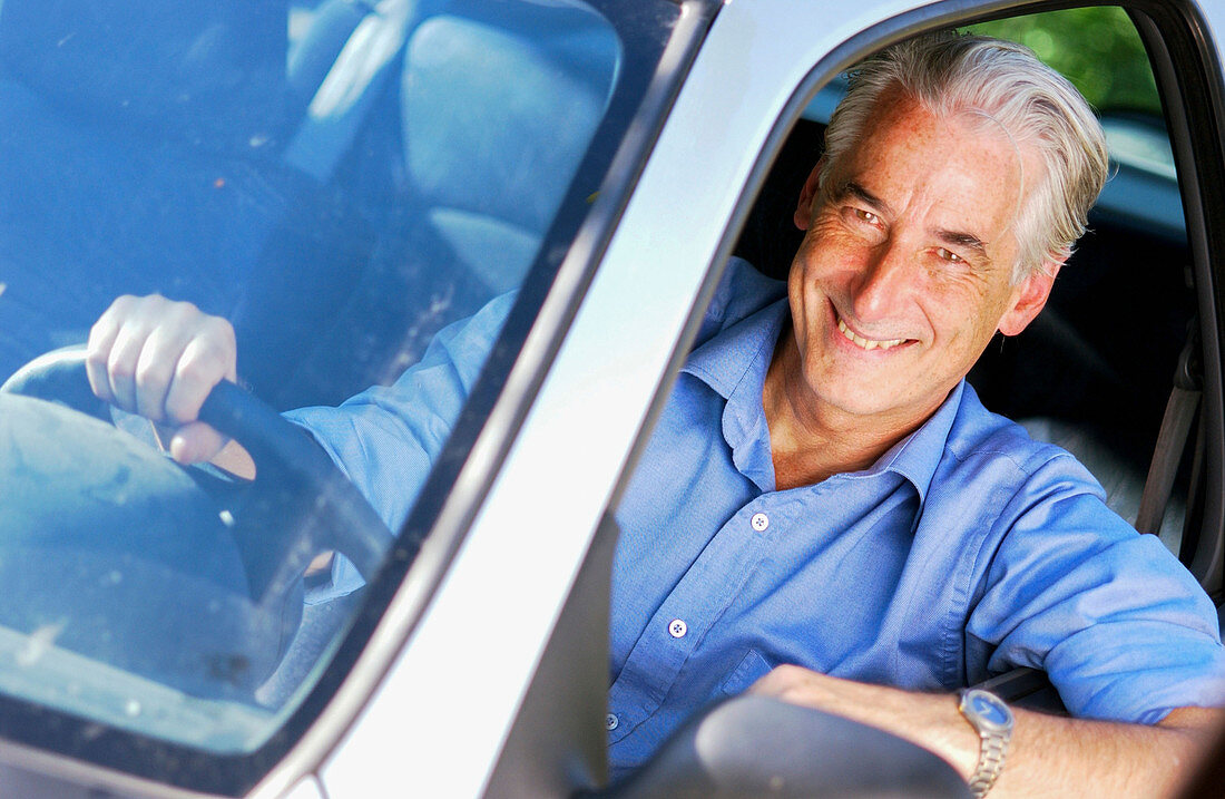 Senior man driving